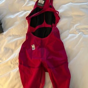 Size 24, NWT, open back, speedo pure valor technical kneeskin racing suit.